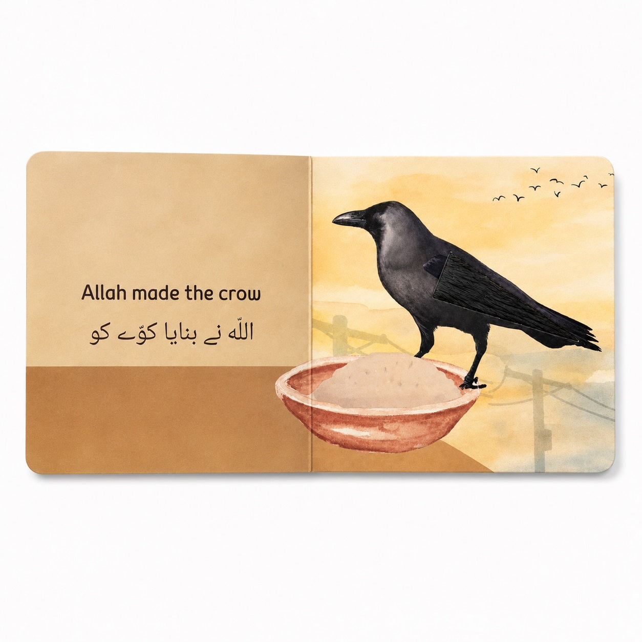Inside page of Allah Made the Animals touch and feel book showing a crow with feather touch and feel texture